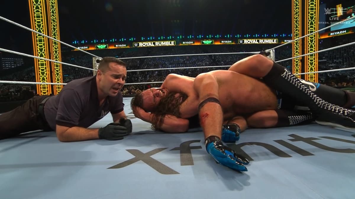 AJ Styles passed out as Gunther has a sleeper applied