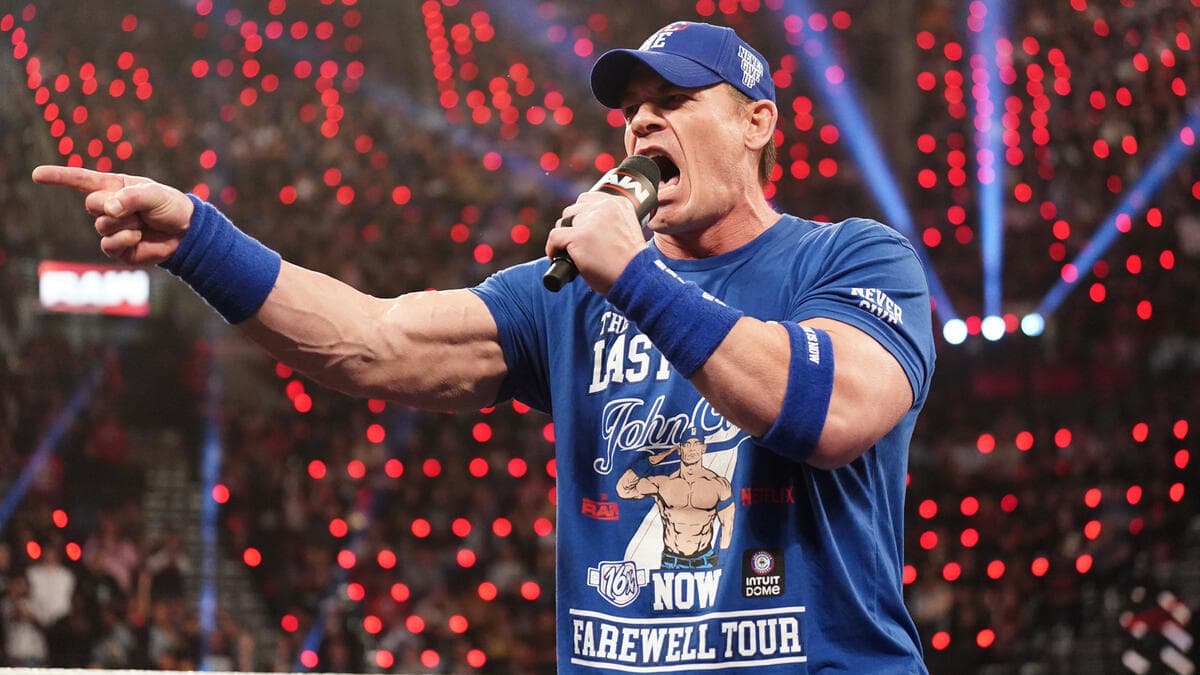 John Cena holds the microphone while cutting a promo during Raw's Netflix premiere