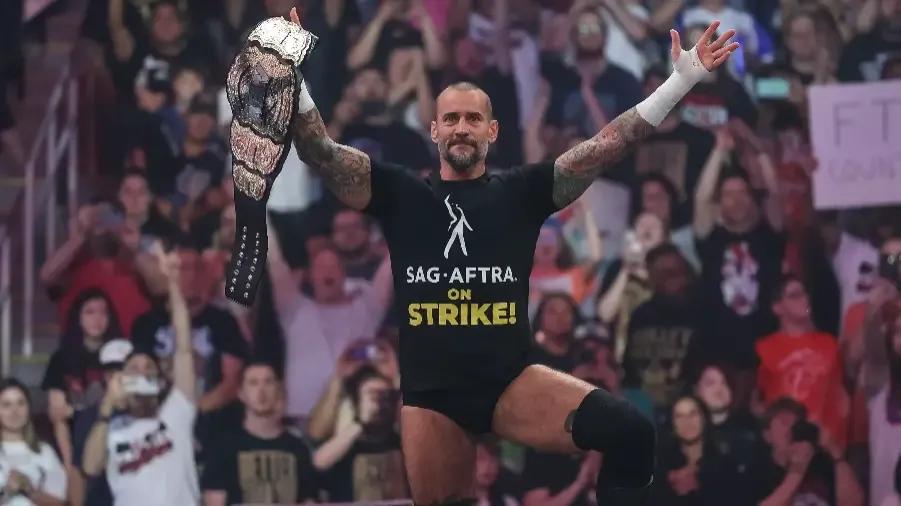 CM Punk August 2023 real world title.jpg