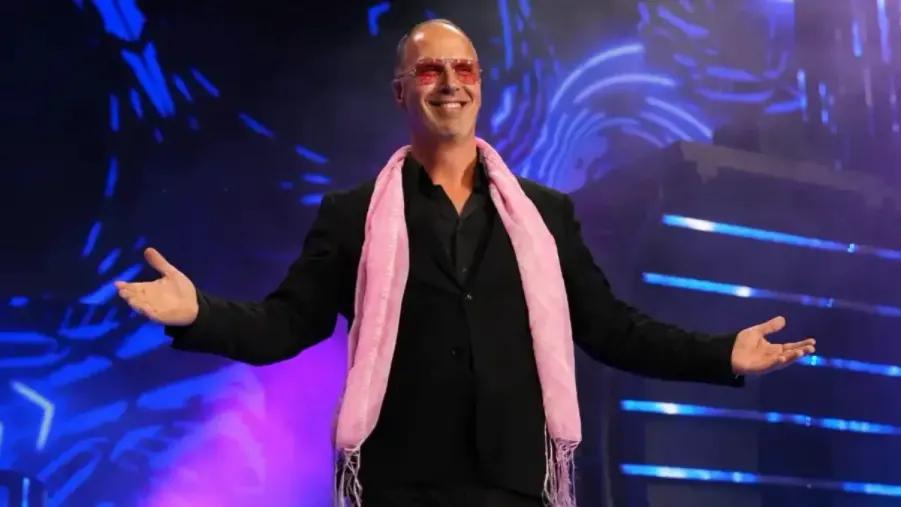 Don Callis AEW lovely pink scarf.jpg