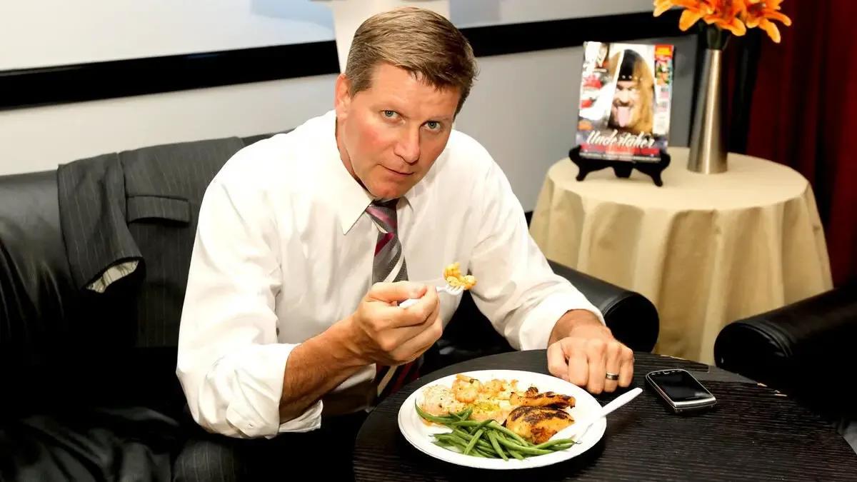 John Laurinaitis Enjoying Catering At WWE Over the Limit 2012.jpg