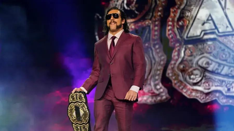 Kenny Omega plum suit November 2021.jpg