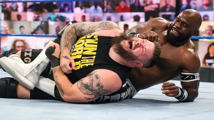 Kevin Owens stretch Apollo Crews.jpg