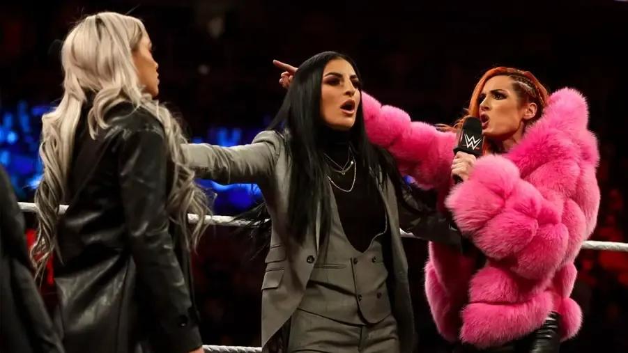 Liv Morgan Becky Lynch Sonya Deville in middle.jpg