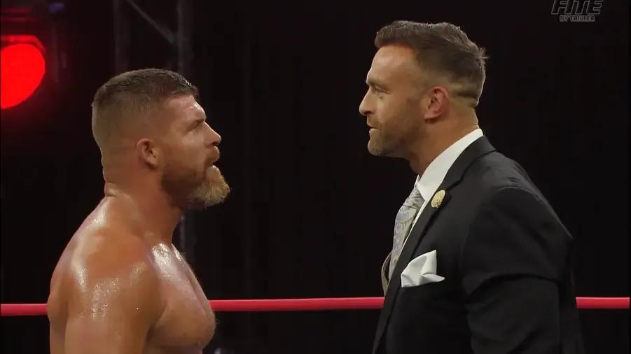 Nick Aldis Steve Maclin stare down Rebellion 2023.jpg