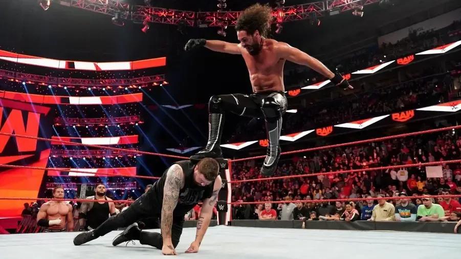 Seth Rollins Kevin Owens Stomp.jpg