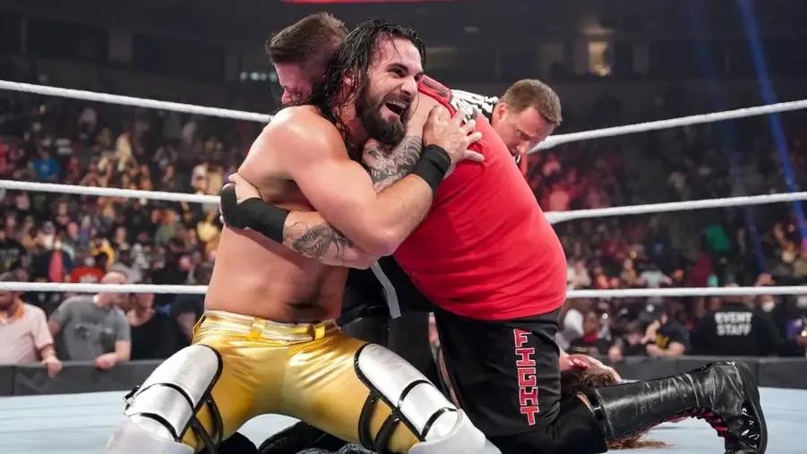 Seth Rollins Kevin Owens big hug.jpg