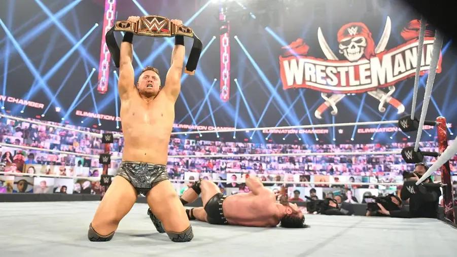 The Miz lifts the WWE Championship over Drew McIntyre at Elimination Chamber 2021.jpg