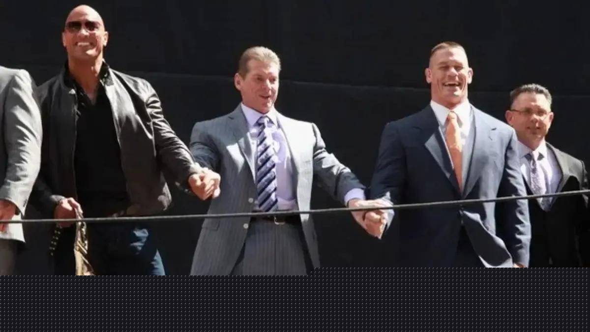 The Rock Vince McMahon John Cena.jpg