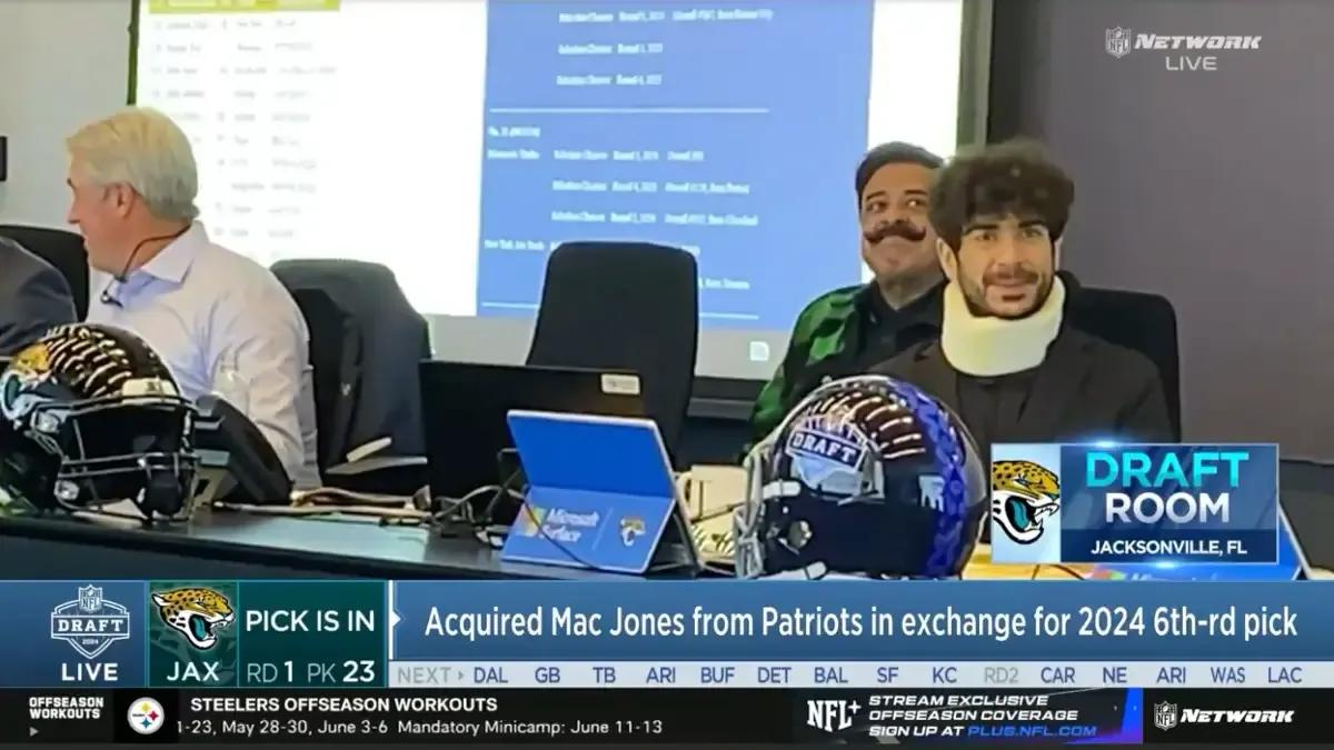 Tony Khan NFL Draft neck brace.jpg