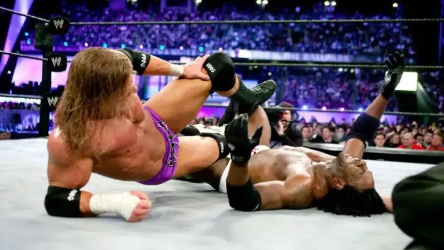 Triple H Booker T WrestleMania XIX.jpg