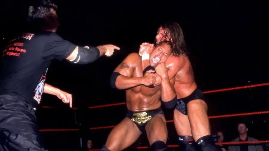 Triple h the rock shane mcmahon insurrextion 2000