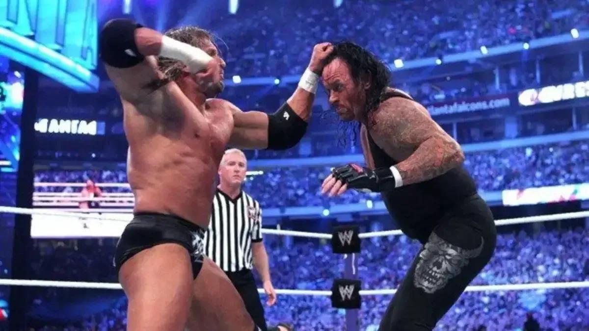 Undertaker triple wrestlemania 27