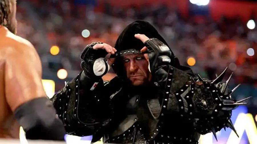 https://cultaholic.com/files/images/b49e856d9fb2a502b11ae5a1ea0f4390c11e5fc9-the-undertaker.jpg