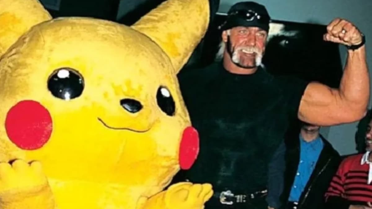 Hulk Hogan flexing his left biceps while standing with Pikachu
