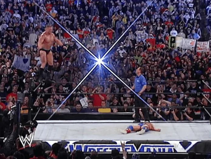 https://cultaholic.com/files/images/08b0d104ad8c1fc5d162a07279b41bafd8429bfb-brock-lesnar-kurt-angle-shooting-star-wrestlemania-19.gif