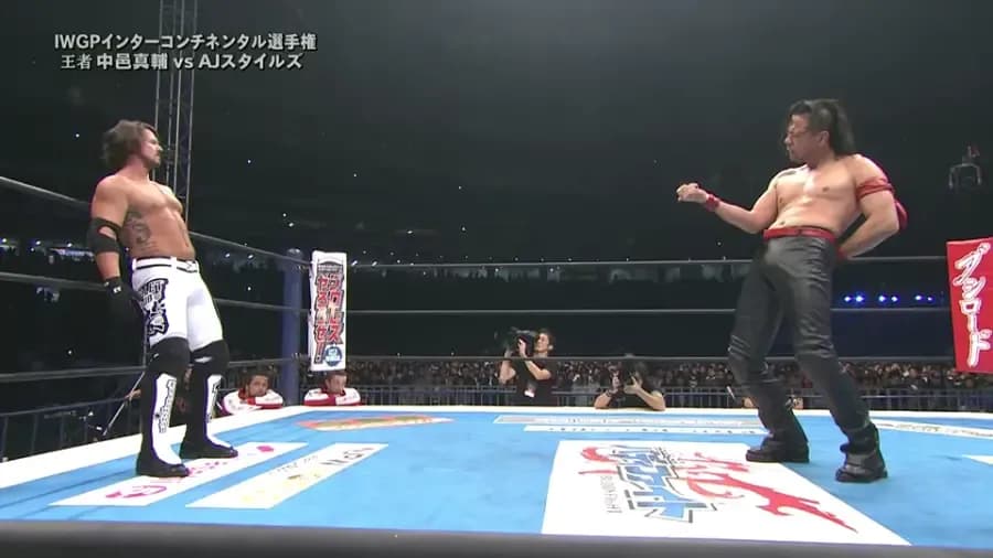 https://cultaholic.com/files/images/2765f037e2d5228aca067da712537c4d5cc9a6c9-AJ-Styles-Shinsuke-Nakamura.png