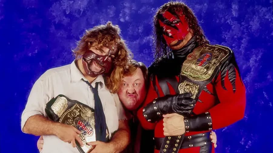 https://cultaholic.com/files/images/311ee547e591ea9dcaed2066079446654c7e4dd9-kane-mankind-paul-bearer.jpg