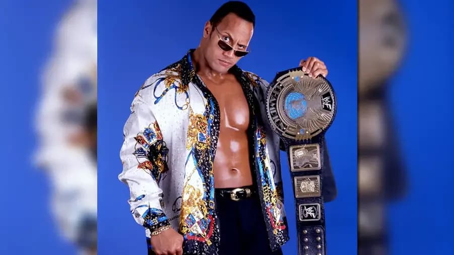 https://cultaholic.com/files/images/437f67030ce8a5b54379a2240c83fea884b84357-the-rock-wwe-championship-attitude-eagle.jpg
