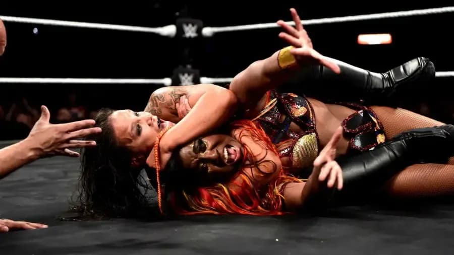 https://cultaholic.com/files/images/dcc3844457c995e5cdd1ceefd896bad99c1269db-Shayna-Baszler-Ember-Moon.jpg